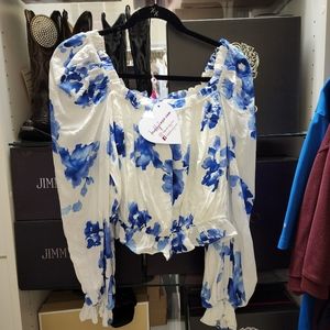 Brand New off the shoulder cropped blouse and blue and white flow blue pattern.